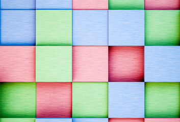 Fototapeta premium Top view of colorful square wooden blocks grid. Abstract geometric multi-colored checkered pattern background.