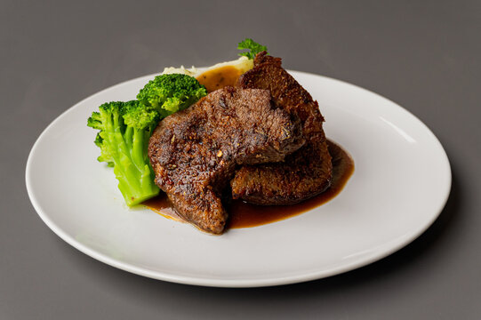 braised short ribs with vegetables and mashed potatoes