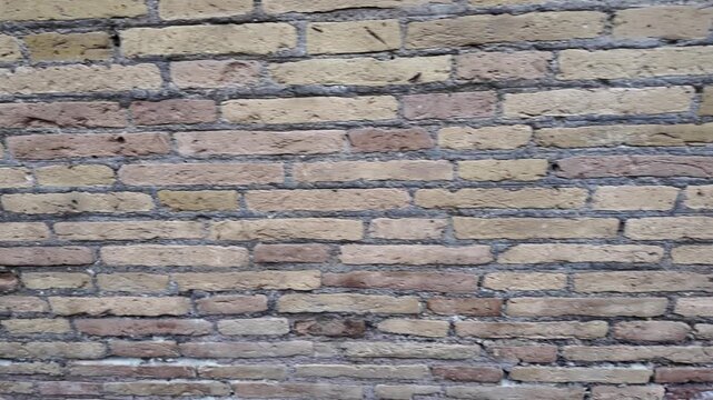 Cinematic Close-Up Of The Weathered Texture Of An Ancient Roman Brick Wall