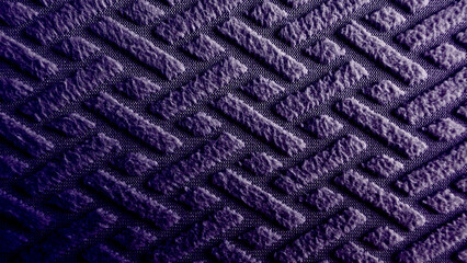 dark purple textured fabric displays geometric embossed herringbone pattern creating moody abstract background © Arthur