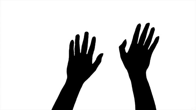 silhouette of Hand rising up show gesturing two hands palm on green screen background