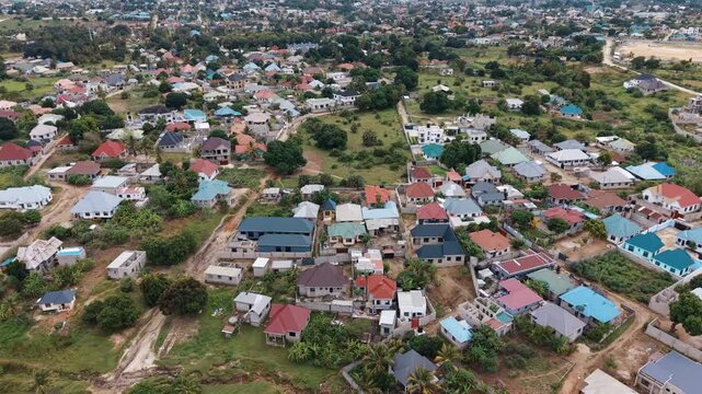 Dar Es Salaam Tanzania - 26 June 2026 - Aerial view of Kigamboni Dar es Salaam showcasing residential settlements houses green landscapes and expanding urban development in Tanzania