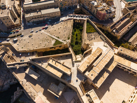 Aerial view of Abercrombie's Bastion featuring historic stone fortifications, rooftops, and urban streets in Valletta, Port Region, Malta.