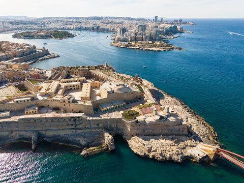 Aerial view of Abercrombie's Bastion and Fort Saint Elmo overlooking the Mediterranean Sea with the city skyline in the distance Valletta, Port Region, Malta.