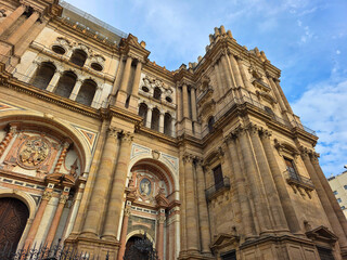 Fototapeta premium Ornate Facade and Towers of the Malaga Cathedral in Andalusia, Spain