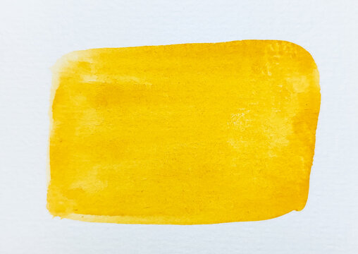 A bright yellow watercolor rectangle painted on textured paper, offering a vibrant minimalist background with organic brushstroke texture.