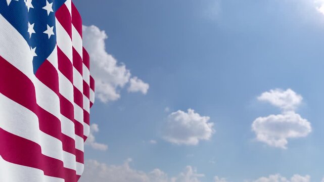 Seamless Loop of American Flag Waving with Copy Space Against Blue Sky and Clouds
