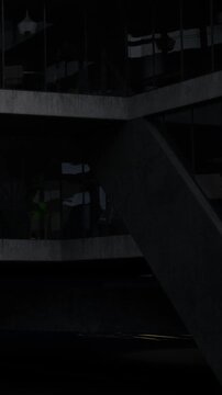 Workers perform tasks at a building site in the evening. The framework of the structure is visible, with tools and materials scattered around. Limited light illuminates the area.