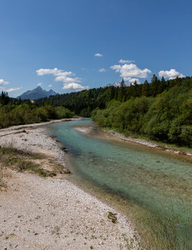 Turquoise Alpine River Flowing Through Bavarian Mountain Valley