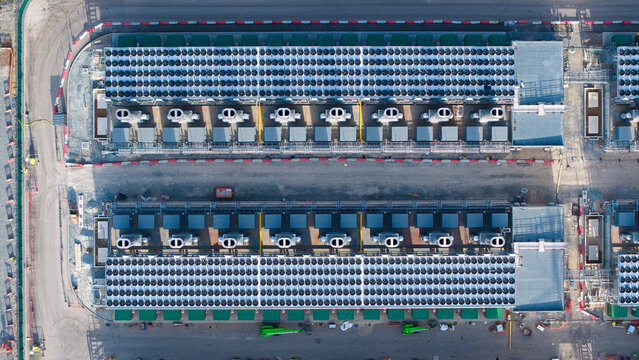 Aerial view of the Thurrock Battery Energy Storage BESS and Flexible Generation Plant with rows of cooling units in Thurrock, England, United Kingdom.