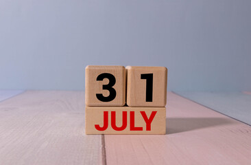July 31 Calendar Date with Copy Space and Office Desk Accessories © Uladzislau