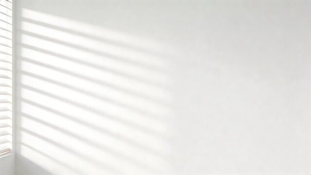Sunlight through window blinds on wall