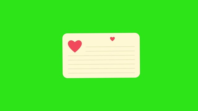 Cream paper note card with a red heart symbol on a green background, suitable for romantic events invitations or lovethemed projects.