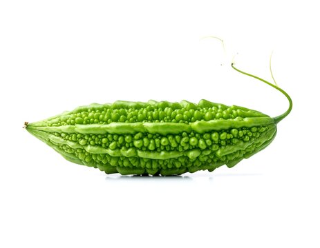 Ultra-realistic studio of fresh bitter melon (momordica charantia) on white background