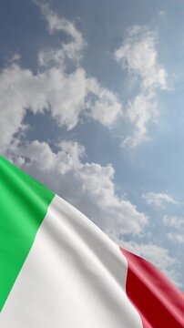 Passenger Airplane Flying Over Italian Flag Waving Against Blue Sky and Clouds Background