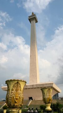 Jakarta, Indonesia - May 26, 2026: Video footage of Monas, or the National Monument, standing tall under a clear sky. The National Monument is a famous landmark in Jakarta.