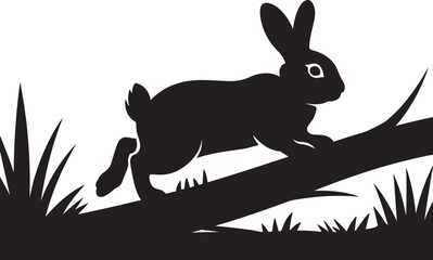 Obraz premium Black rabbit silhouette walking on a fallen log in a field of grass