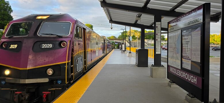 Commuter Rail Train Arriving at Middleborough Platform, Symbolizing Urban Connectivity and Daily Public Transportation Travel