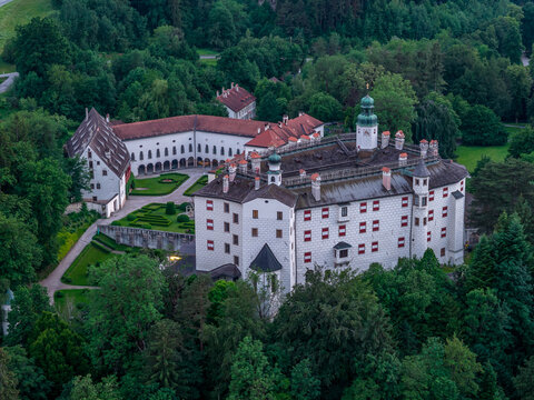 Close aerial view of Schloss Ambras Renaissance castle showing Upper Castle, gallery wing and gardens, Innsbruck, Tyrol, Austria