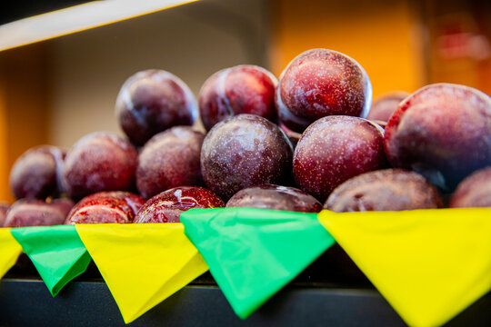 Fresh Red Plums at Market