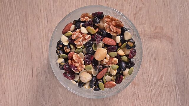 Mixed nuts in the glass bowl