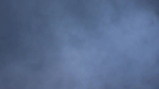 Dense white incense smoke rising slowly full frame atmospheric cinematic transition overlay