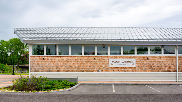 Rome, NY - May 20, 2026: Exterior of the Jason P. Andris Boathouse at Bellamy Harbor Park providing rowing support, waterfront storage, and recreational facility functions located in Rome, NY 13440