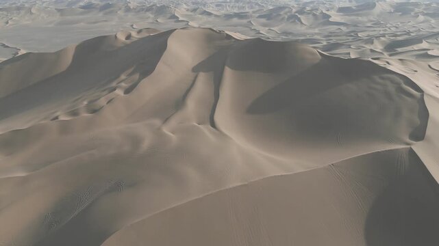 Desert Mountain Scenery At The Mingsha Mountains (Echoing-Sand Mountain) Near Dunhuang In Gansu Province, China. Panning Shot.