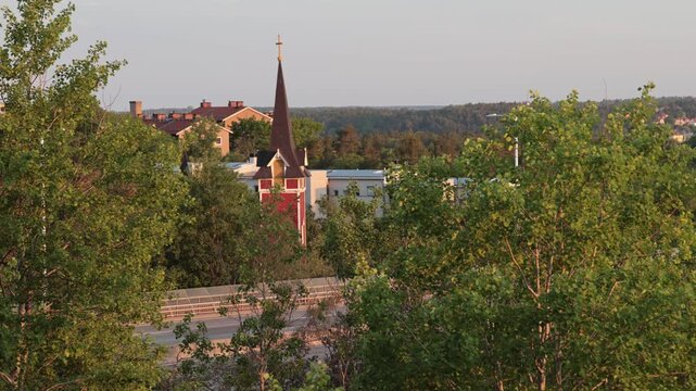 Stockholm, Sweden A sunrise over the elevated Essingeleden and E4 highway and the S:t Sigfrids kyrka. 