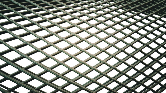 Close up of a dark metal grid pattern with diamond shaped openings