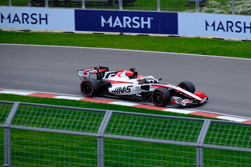 Obraz premium May 24, 2026, Montreal, Canada - Haas Formula 1 car on track by Ocon and Bearman at Circuit Gilles Villeneuve. g.