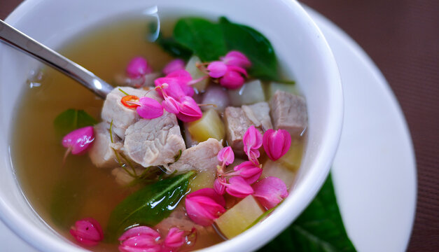 Chef Table menu, Thai Clear Soup with Pork Cubes and Edible Pink Mexican Creeper Flowers