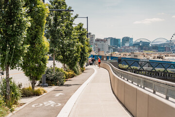 Fototapeta premium Seattle New Waterfront with Aquarium, Pike Place, and Park. View of the Puget Sound from the viewpoint on the waterfront park.