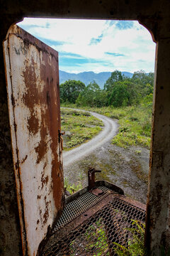View of road inside Panguna mine town from abandoned crane machine in Autonomous Region of Bougainville, Papua New Guinea