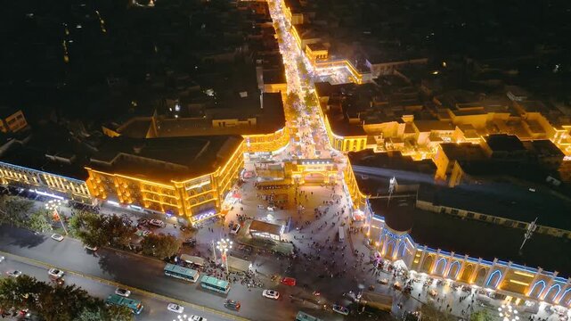 Aerial Night View of Illuminated Busy City Intersection