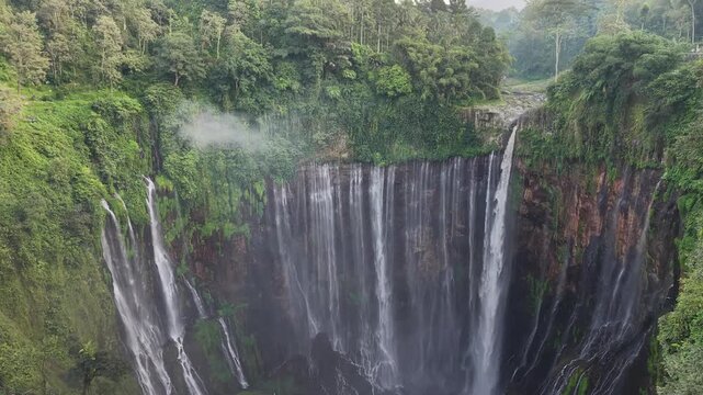 Amazing aerial view Tumpak Sewu waterfall in the morning on Java island, Indonesia.
