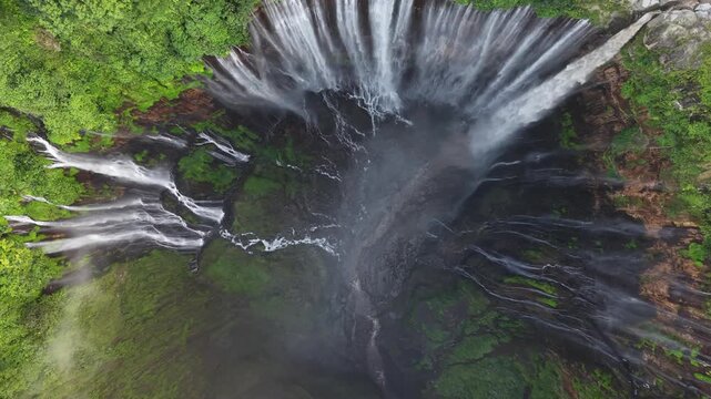 Amazing aerial view Tumpak Sewu waterfall in the morning on Java island, Indonesia.
