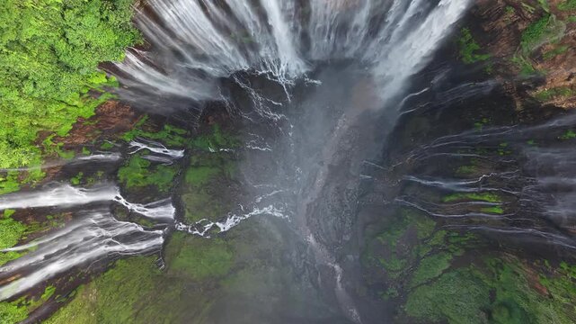 Amazing aerial view Tumpak Sewu waterfall in the morning on Java island, Indonesia.
