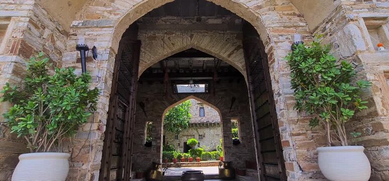 An old  grand stone archway at the main entrance of Dadhikar Fort in Alwar, Rajasthan, India.