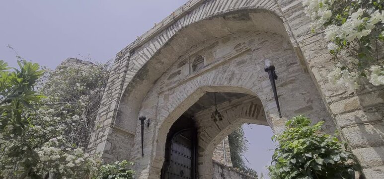 An old  grand stone archway at the main entrance of Dadhikar Fort in Alwar, Rajasthan, India.