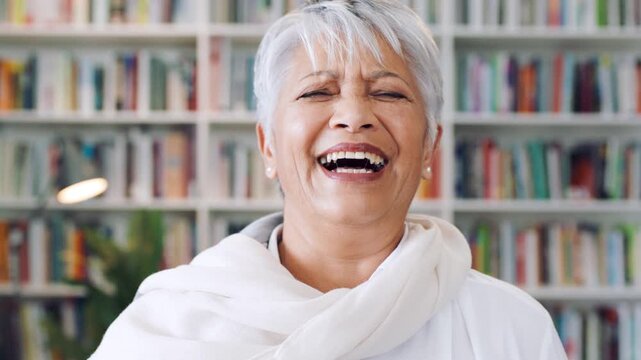 Creative, face and woman with smile in library, education or pride for publishing career development. Bookstore, author and mature person with knowledge, laughing and confident with literacy job