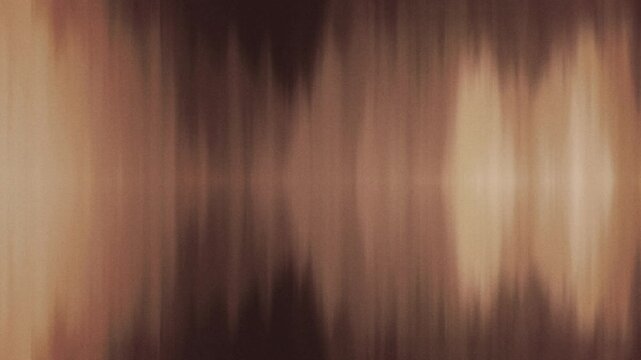 Soft brown waves. Grainy gradient abstract background loop. Mysterious interplay of shadow and light.