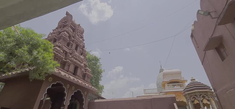Traditional Red Shikhara Temple Top and Inner Courtyard Architecture of Bhartrihari Caves in Ujjain Madhya Pradesh