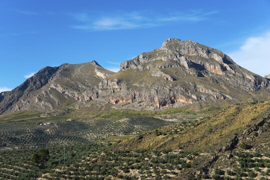 Large mountains and green hills under a clear blue sky, a picturesque example of natural beauty, Alto de la Serrezuela mountain, near Bedmar y Garc&iacute;ez, Bedmar y Garciez, Sierra M&aacute;gina Natural Park, Ja&eacute;n province, Jaen, Andalusia, Spain