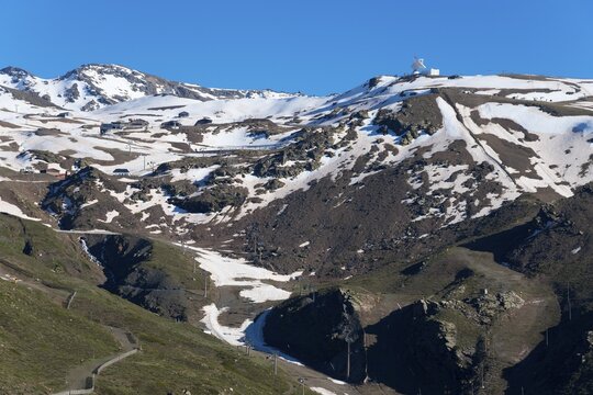 Snowy mountain landscape with clear blue sky and peaks in the background, mountains at Pico del Veleta, Veleta peak, G&uuml;&eacute;jar Sierra, G&uuml;ejar, Sierra Nevada, Andalusia, Spain
