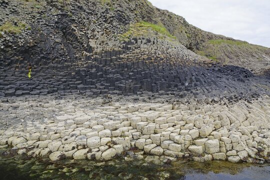 Detailed view of striking basalt formations on a coastline. Hebridean Overture, Staffa Island, Inner Hebrides, Scotland, Great Britain