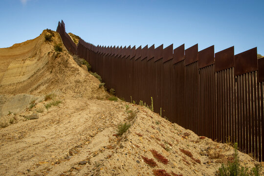 Looking up at the international boarder wall from Tijuana Mexico