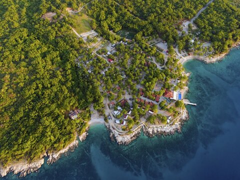 Drone shot, coast near Glavotok with campsite, Krk Island, Kvarner Gulf Bay, Primorje-Gorski kotar, Croatia