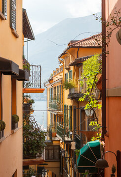 Narrow street with tourists in Varenna Italy