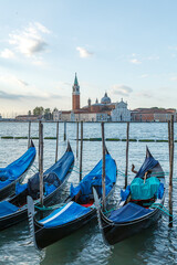 Obraz premium Gondolas moored on Venice lagoon